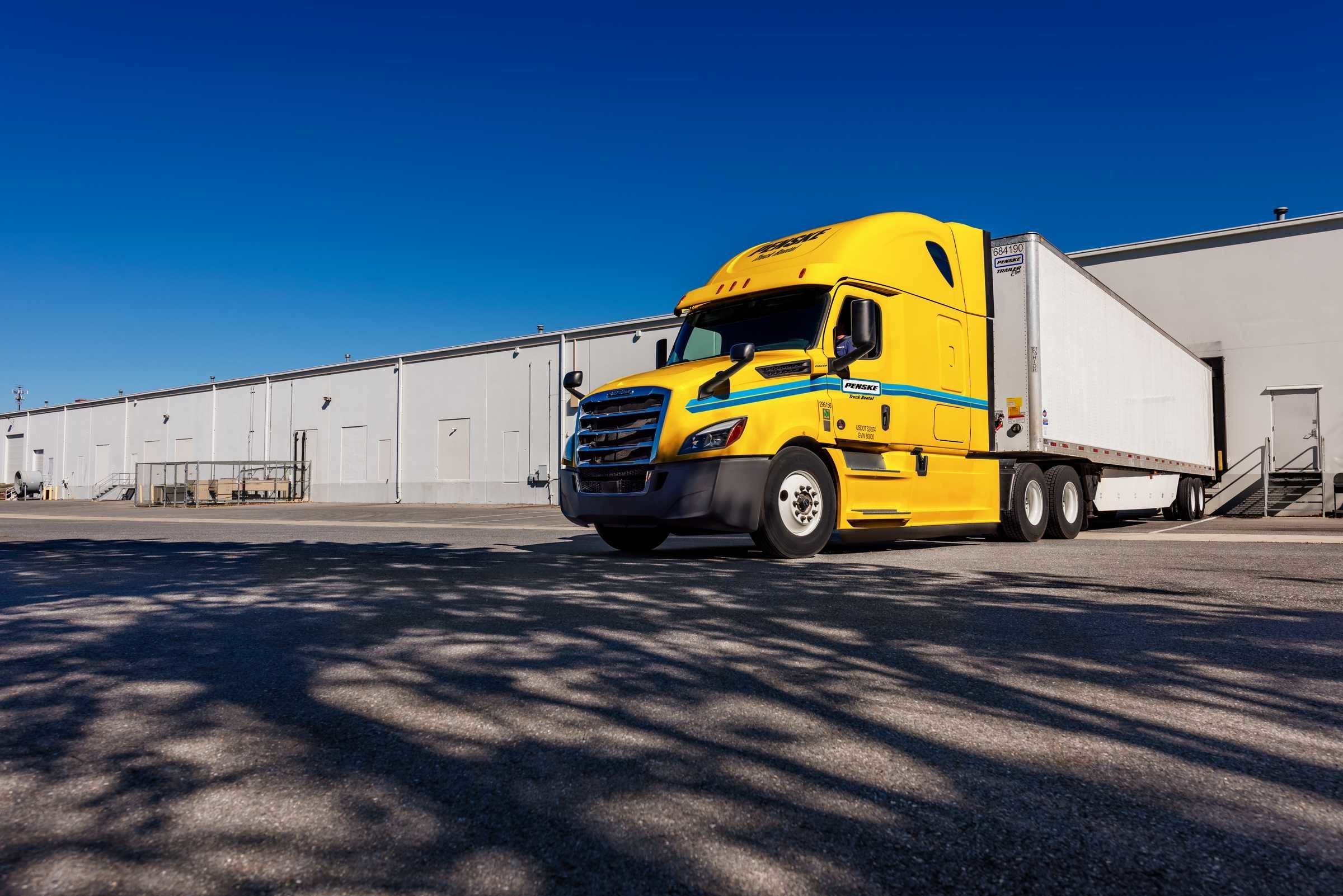 penske tractor and trailer at warehouse