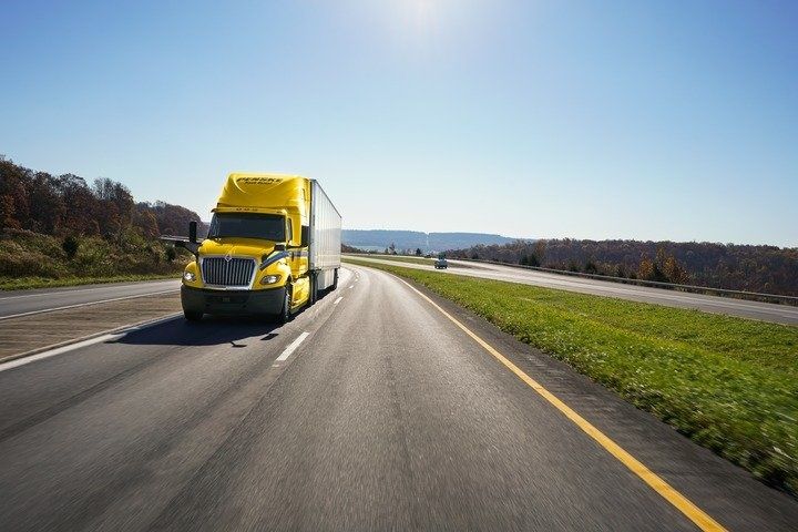 Penske tractor and trailer on highway