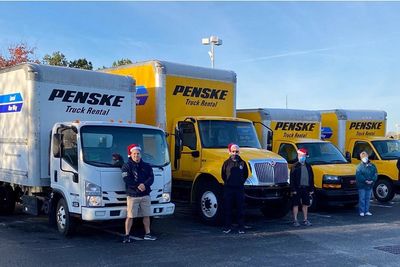 Penske trucks with Santa's helpers