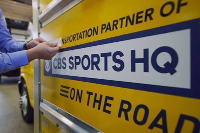 cbs sports hq decal on penske truck