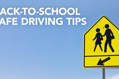 people walking street sign