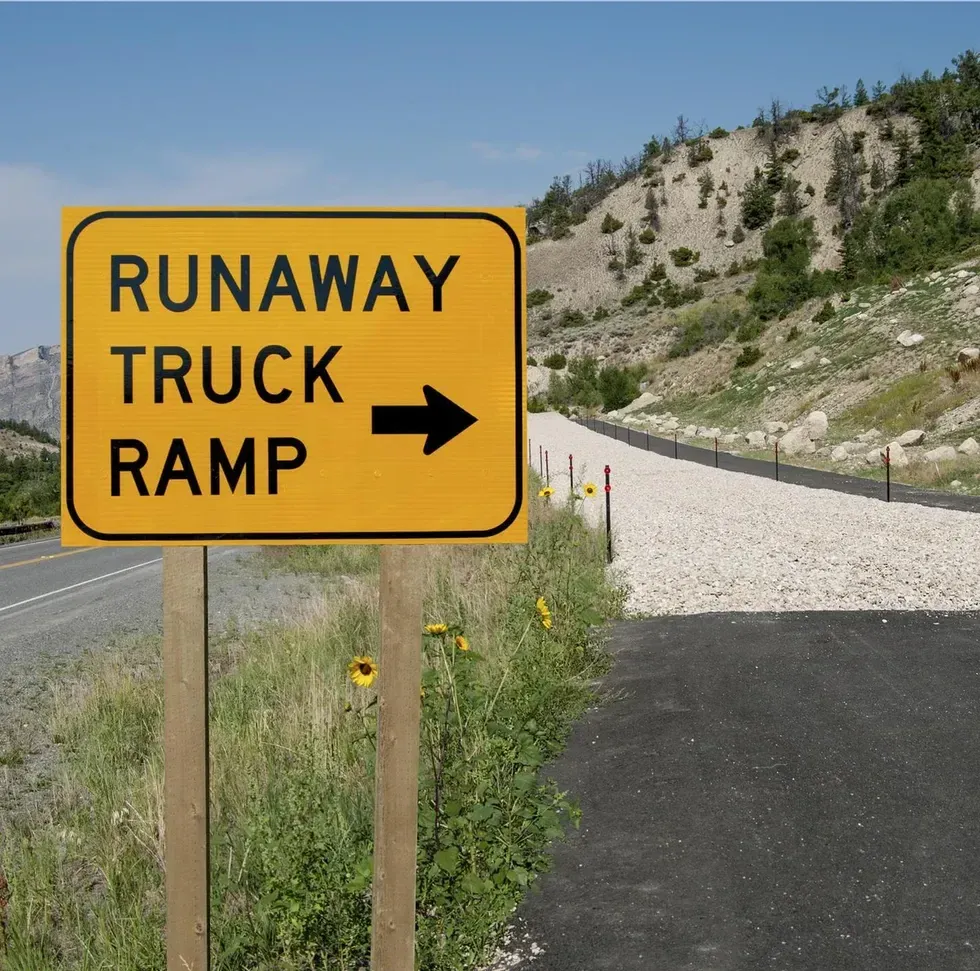 Runaway truck ramp and sign and ramp