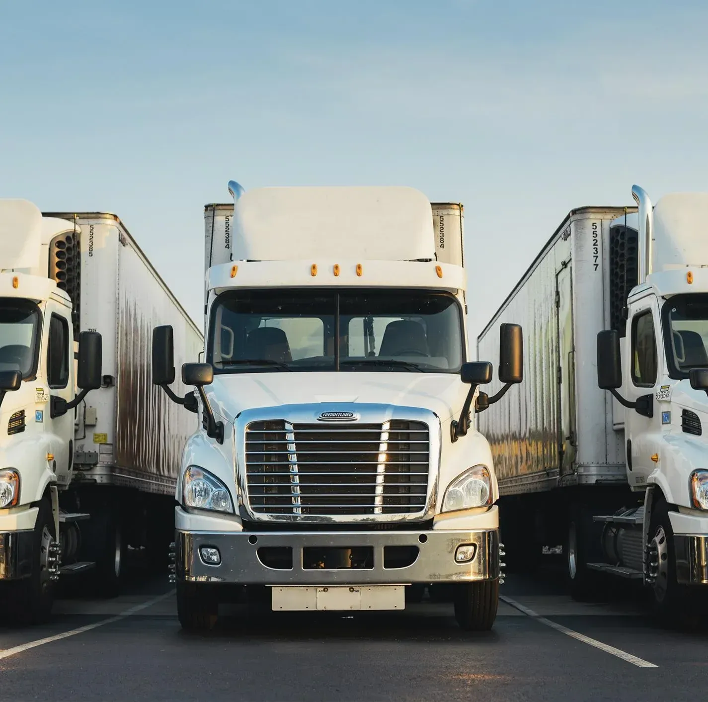 White semi-truck parked in a lot