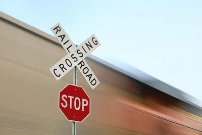 Railroad crossing and stop sign